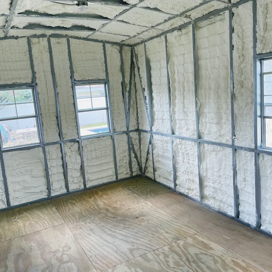 Closed-cell spray foam insulation applied to wall cavities in a residential project in Lowell